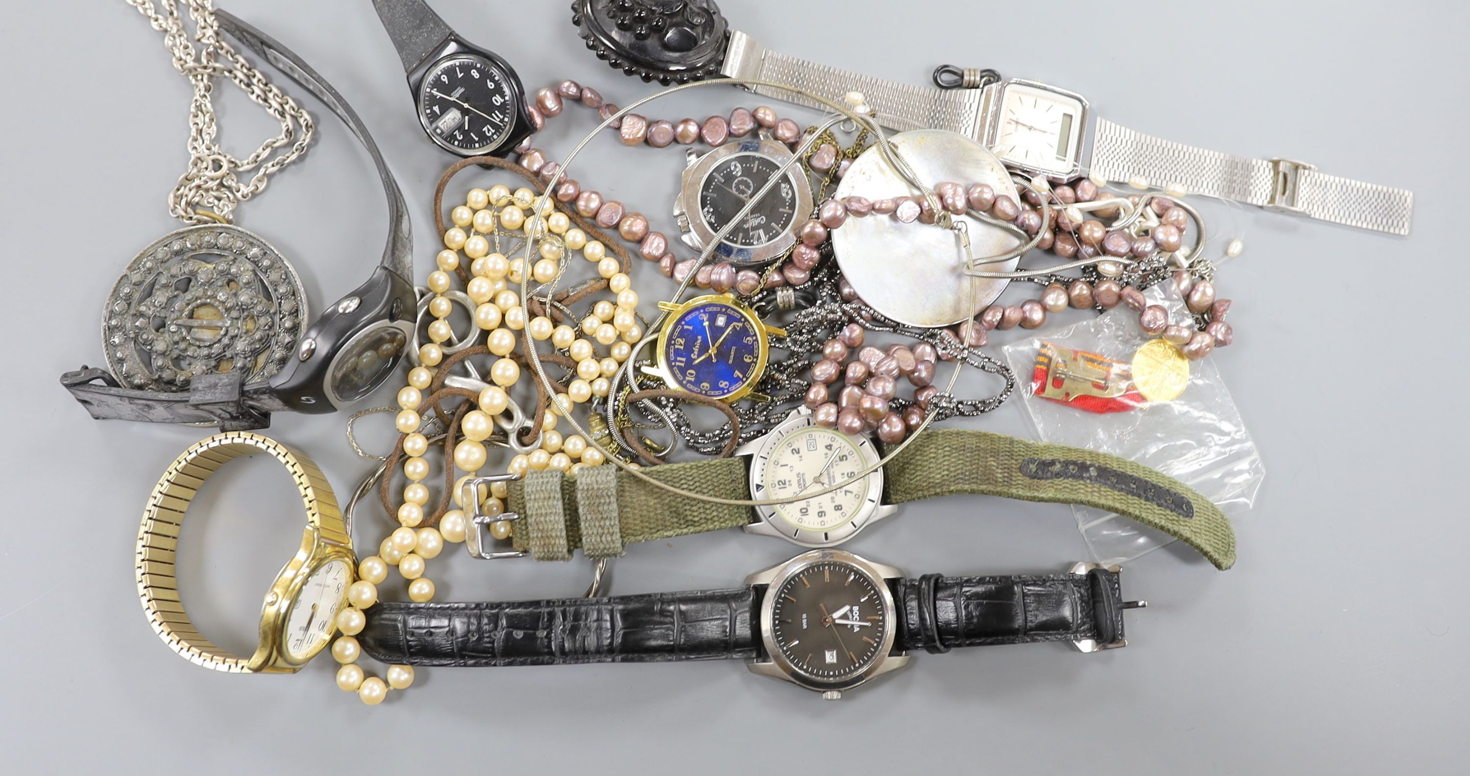 A small quantity of modern minor wrist watches and assorted costume jewellery.